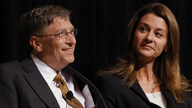 Bill Gates, left, smiles with his wife Melinda Gates. Picture: AP Photo/Jacquelyn Martin