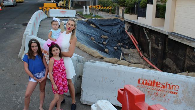 The 2017 sinkhole that almost swallowed Wentworth Ave, Point Piper: Kristy Mirzikinian and her daughters Ameila, Ashley (pink) and Audrey, 9 (blue).