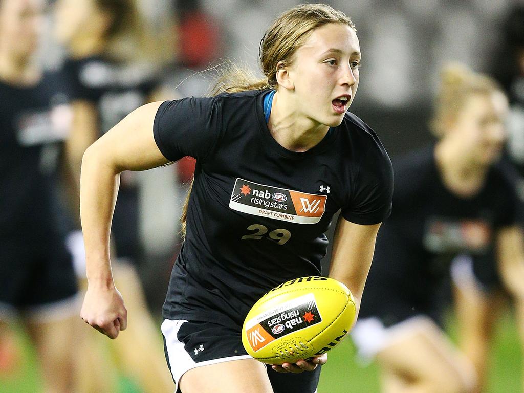 Charlotte Wilson dishes off a handball at the AFLW Draft Combine. Picture: Michael Dodge/Getty Images