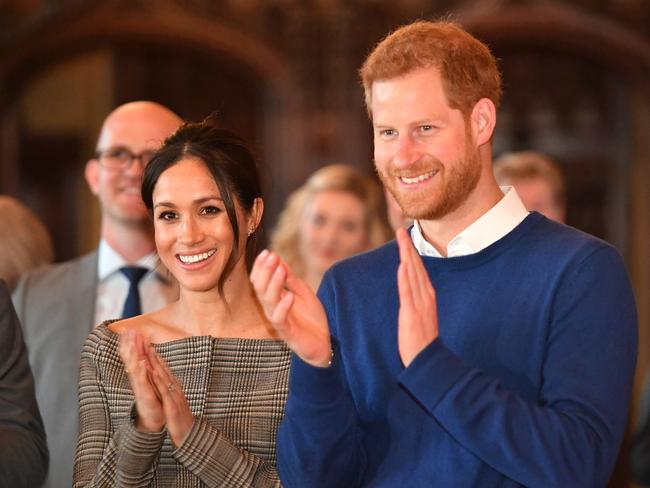 Prince Harry and his fiancee Meghan Markle watch a performace during their visit to Cardiff Castle on January 18, 2018 in Cardiff, Wales. Picture: Getty