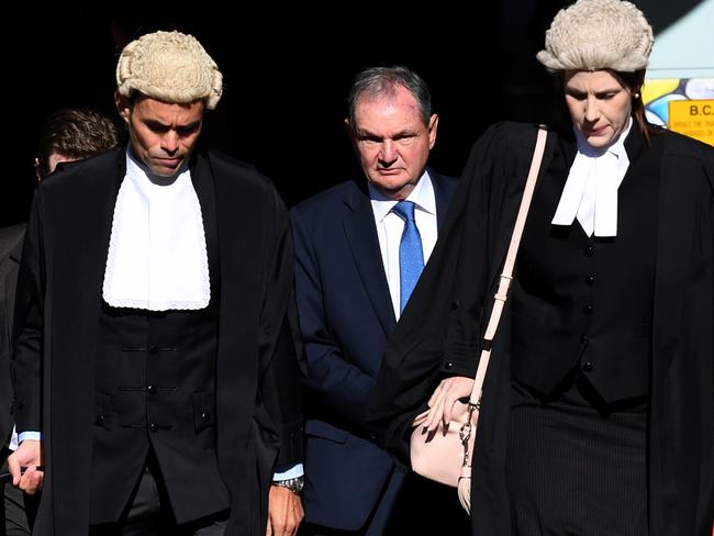 Former Ipswich mayor Paul Pisasale (centre) arrives at the District Court in Brisbane. Picture: AAP/Dan Peled