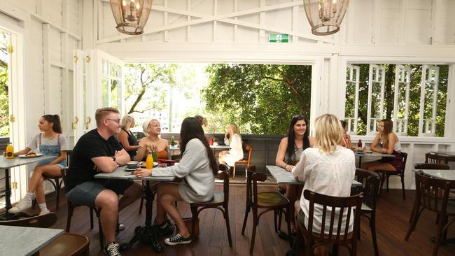 Diners munching on some goods at the upstairs eating area at Paddock Bakery at Miami. Picture: Glenn Hampson