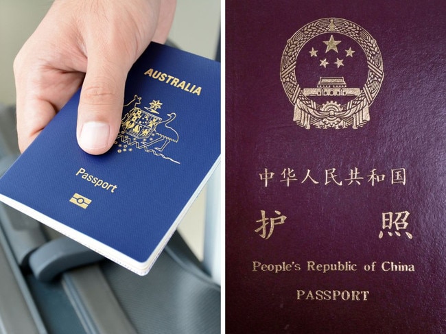 Close-up on a Chinese passport isolated on a white background.