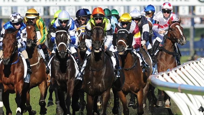 Tommy Berry (right) suffers interference on Glencadam Gold in the first lap of the Caulfield Cup. Picture: Getty Images