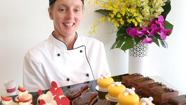 Lucy Jones with a tray of cakes.