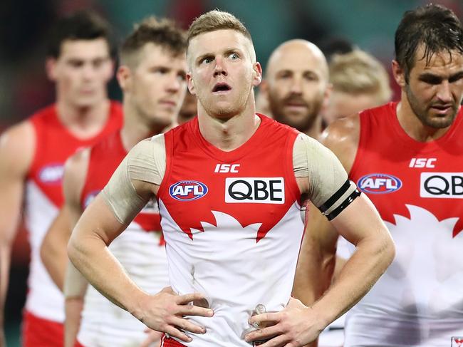 SYDNEY, NEW SOUTH WALES - SEPTEMBER 08: Daniel Hannebery of the Swans looks dejected as the walks from the field after defeat in the AFL Second Elimination Final match between the Sydney Swans and the GWS Giants at Sydney Cricket Ground on September 8, 2018 in Sydney, Australia.  (Photo by Mark Metcalfe/AFL Media/Getty Images)