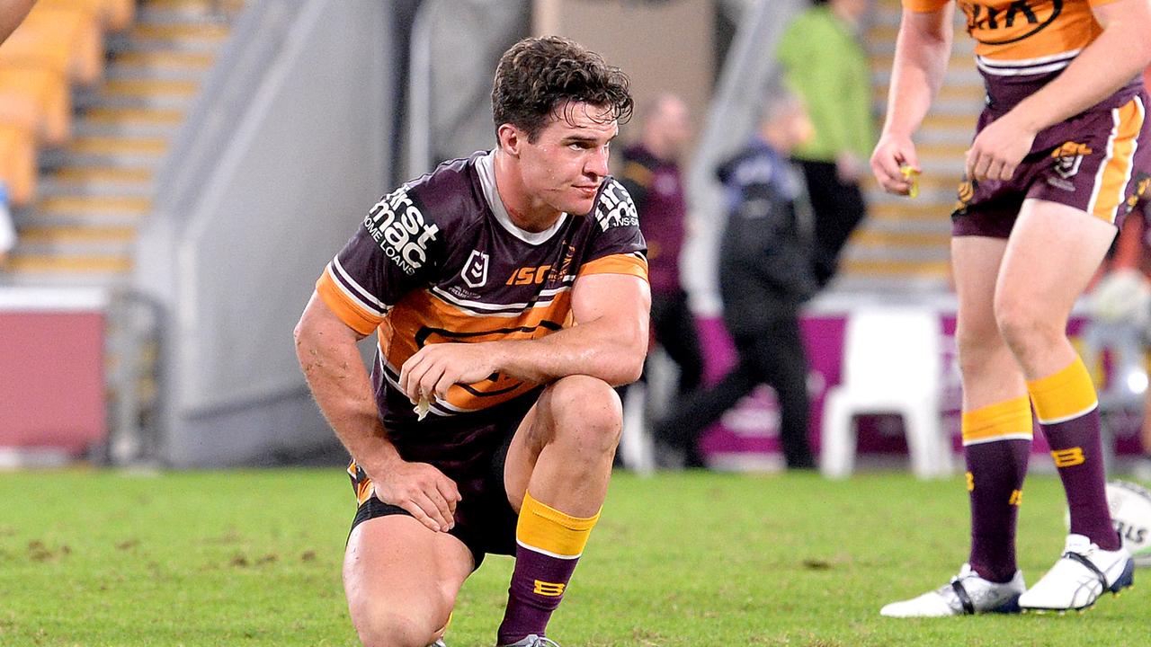 Brodie Croft of the Broncos looks dejected.