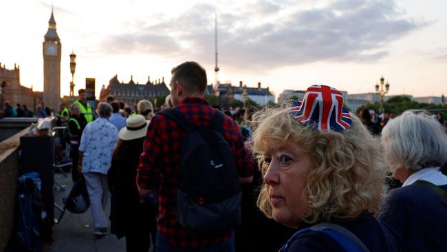 Members of the public join the queue on Westminster Bridge, as they wait in line to pay their respects to the late Queen Elizabeth II, Lying-in-State in the Palace of Westminster.