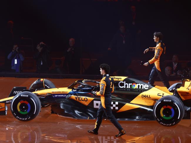 LONDON, ENGLAND - FEBRUARY 18: Lando Norris of Great Britain and McLaren Oscar Piastri of Australia and McLaren at the team livery presentation during F1 75 Live at The O2 Arena on February 18, 2025 in London, England. (Photo by Zak Mauger/Getty Images)