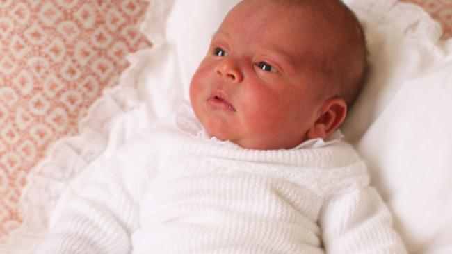 Prince Louis wore a hand-me-down knitted sweater set from Irulea for his first official portrait. Picture: AFP