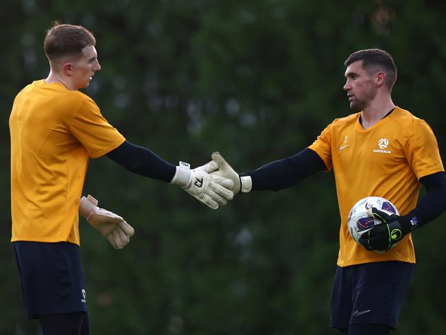 Goalkeepers Joe Gauci (left) and Mat Ryan are vying to be No.1. Picture: Francois Nel/Getty Images