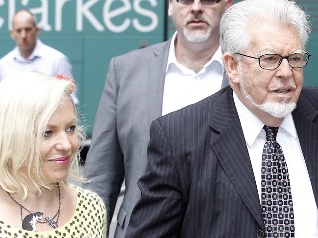 LONDON, UNITED KINGDOM - JUNE 16:   Rolf Harris arrives at Southwark Crown Court accompanied by daughter Bindi, wife Alwen and Niece Jenny on JUNE 16, 2014 in London, England. (Photo by Alex Huckle/GC Images)