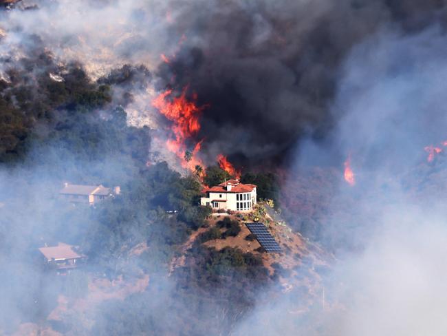 A 17,000-acre blaze in Pacific Palisades has become ‘one of the most destructive natural disasters in the history of Los Angeles’. (Photo by David Swanson / AFP)