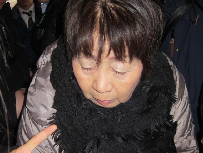 (FILES) This file photo taken on March 13, 2014 in Kyoto shows Japanese woman Chisako Kakehi, known as "Black Widow",  who is accused of poisoning of four elderly men with cyanide. A Japanese "black widow" accused of multiple murders reportedly gave contradicting statements this week in July 2017 as her trial opened in a case that has gripped the nation. Chisako Kakehi, a 70-years-old said to be in an the early stage of dementia, said she left everything to her lawyers as she went on trial in western Japan's Kyoto in June 2017. / AFP PHOTO / JIJI PRESS / STR / Japan OUT