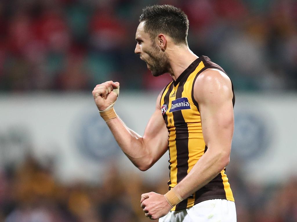 Jack Gunston of the Hawks celebrates kicking a goal during the Round 23 AFL match between the Sydney Swans and the Hawthorn Hawks at the SCG in Sydney, Saturday, August 25, 2018. (AAP Image/Brendon Thorne) NO ARCHIVING, EDITORIAL USE ONLY