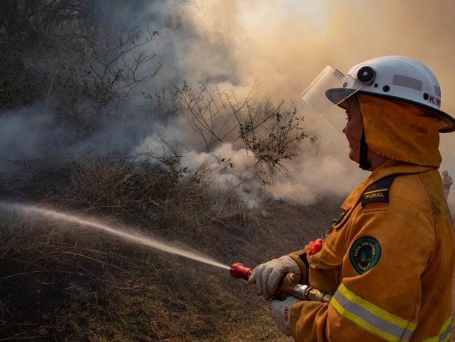 Generic photo of rural firey tackling a bushfire