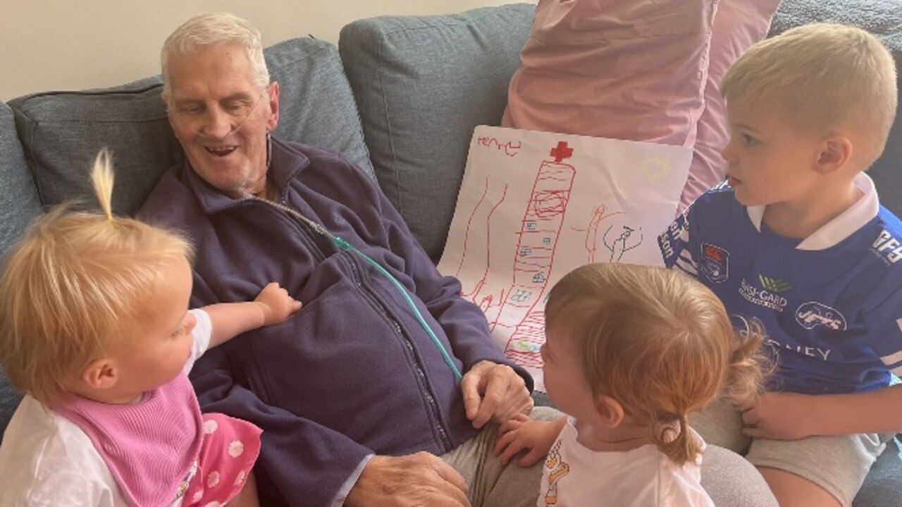 Ken Wilson with his grandkids (from left) Audrey, Violet and Henry