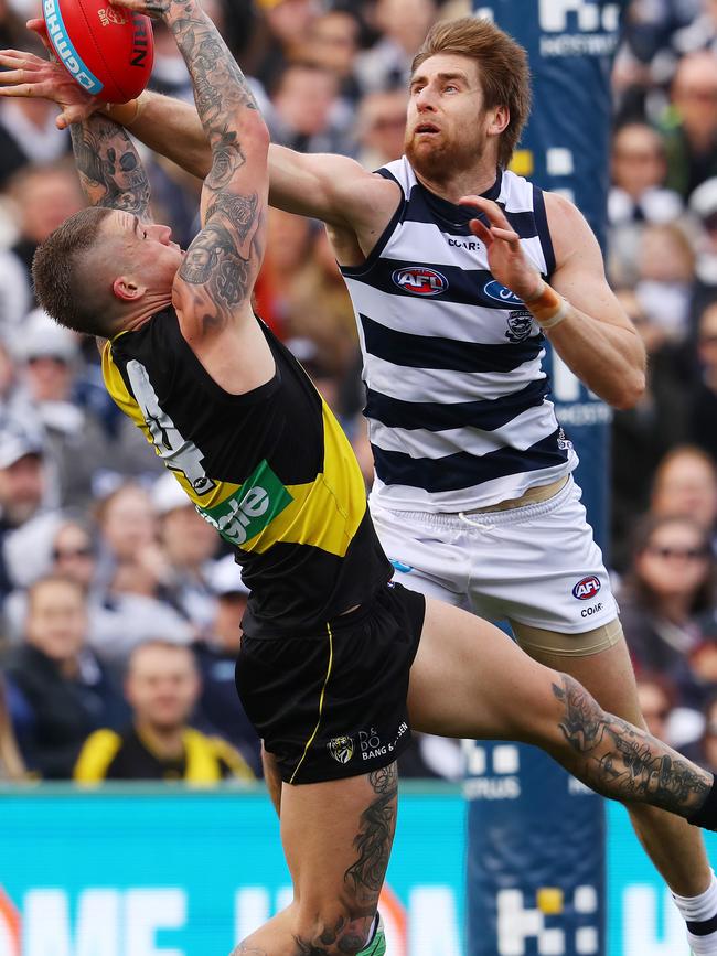 Tom Lonergan attempts to spoil Richmond’s Dustin Martin. Picture: Michael Klein. 