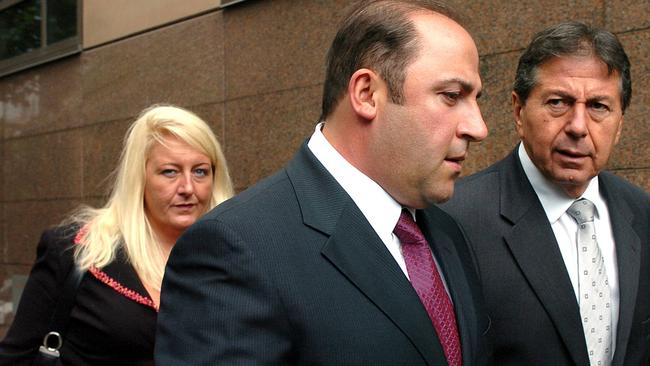 Tony Mokbel (centre) with his legal team Nicola Gobbo (left) and Con Heliotis QC (right) outside court.