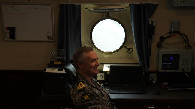 Commander Tony Nagle inside his day quarters onboard the HMAS Perth. Picture: (A)manda Parkinson