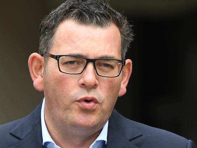 Victorian Premier Daniel Andrews and Victorian Treasurer Tim Pallas speak to the media during a press conference in Melbourne, Saturday, March 21, 2020. (AAP Image/Erik Anderson) NO ARCHIVING