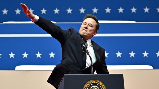 Tesla and SpaceX CEO Elon Musk gestures as he speaks during the inaugural parade inside Capitol One Arena, in Washington, DC, on January 20, 2025. Photo by ANGELA WEISS / AFP