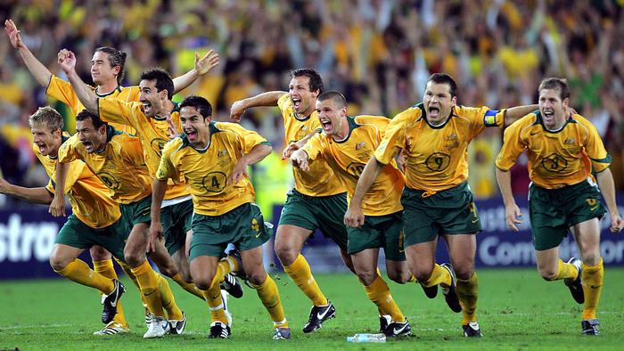 07/06/2006 LIBRARY: Socceroos players including captain Mark Viduka (7), celebrate after Australia defeated Uruguay in 2006 FIFA World Cup Qualification (2nd leg) match at Telstra Stadium, Olympic Park, Homebush in Sydney.