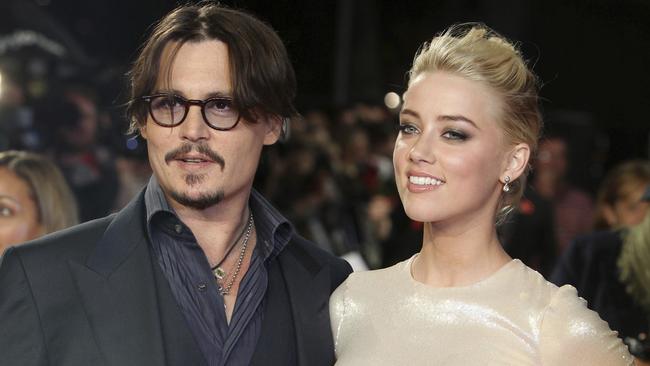 Johnny Depp pictured with Amber Heard in 2011. Picture: AP