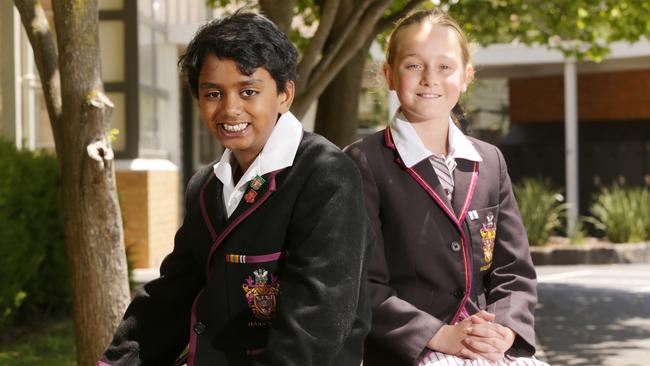 Haileybury College Year Six students Luca and Evie celebrate their NAPLAN results. Picture: Norm Oorloff