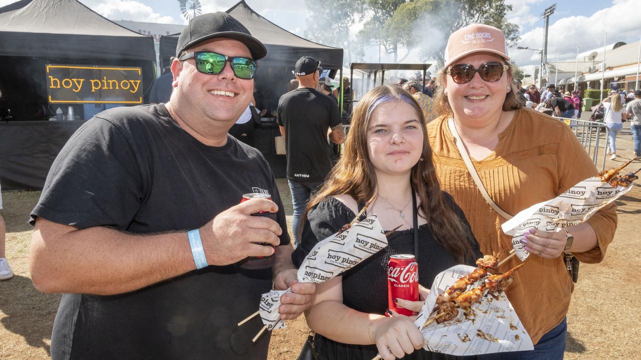 (from left) Chris Wendt, Isabella Wise-Wendt and Rebecca Courtney. Meatstock 2023 at Toowoomba Showgrounds. Saturday, April 15, 2023. Picture: Nev Madsen.