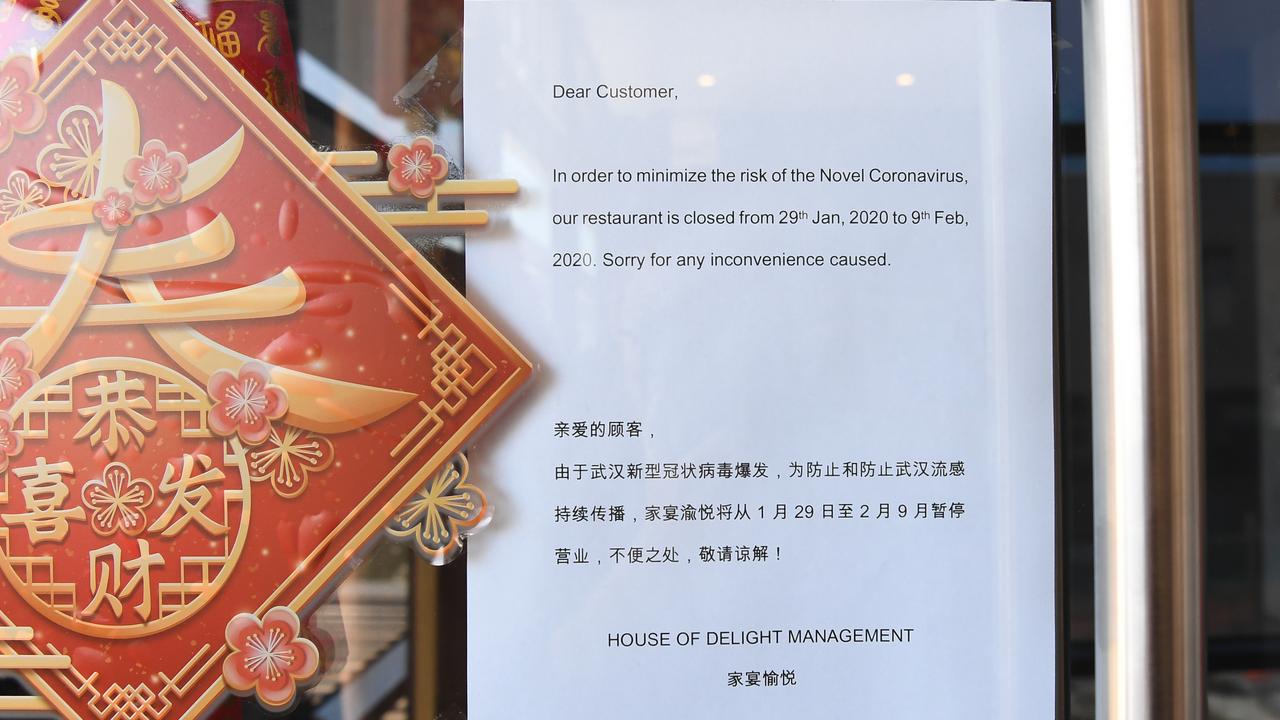 Sign on the door of the House of Delight restaurant in Glen Waverley informing that they will be shut until February 9. Picture: AAP Image/James Ross