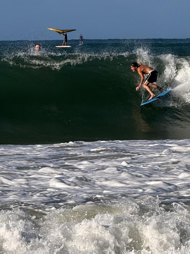 Board riders were being crunched in the big swell at Mooloolaba late Thursday afternoon as Tropical Cyclone Alfred hovered off the Qld coastline. Photo: Mark Furler