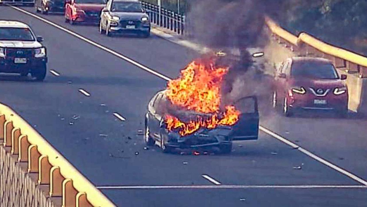 Chaos as car bursts into flames on freeway