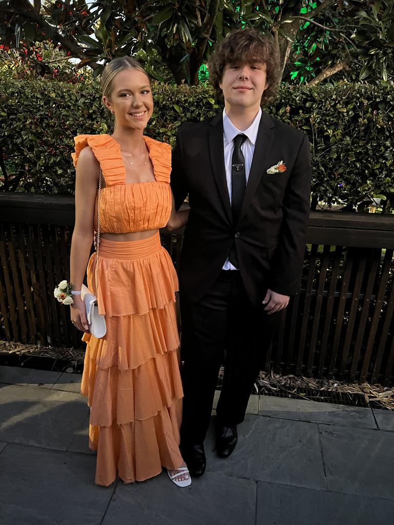 Isabelle Wootton and Kyle Taylor dressed for the Year 12 Chisholm Catholic College formal and Victoria Park Marquee.