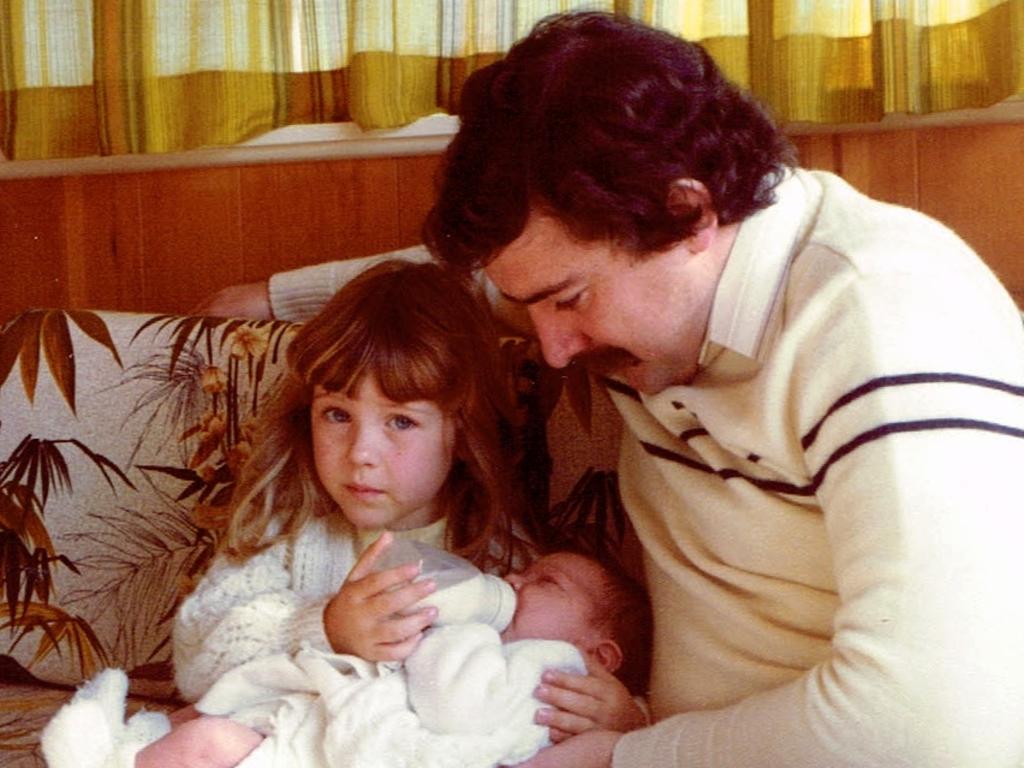 Rachelle Childs with her father Graham nursing Kristy