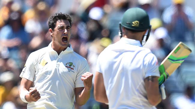 Australian bowler Mitchell Starc reacts after dismissing South African captain Faf du Plessis.
