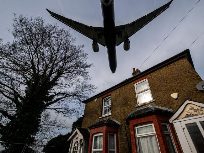 European Best Pictures Of The Day - February 27 - LONDON, ENGLAND - FEBRUARY 27: Aircraft come in to land at Heathrow airport over nearby houses on February 27, 2020 in London, England. Plans for a third runway at Heathrow airport have been ruled illegal by the court of appeal because it is said that the government's climate change commitments were not adequately taken into account. The UK government will not appeal the decision whilst they have set a target in law of net zero emissions by 2050. (Photo by Chris J Ratcliffe/Getty Images)