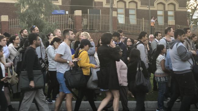 Commuters wait for replacement buses at Kensington station. Picture: Supplied