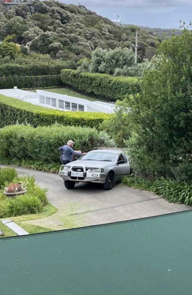 Don Scott's car wedged on the side of the driveway. Picture: Supplied