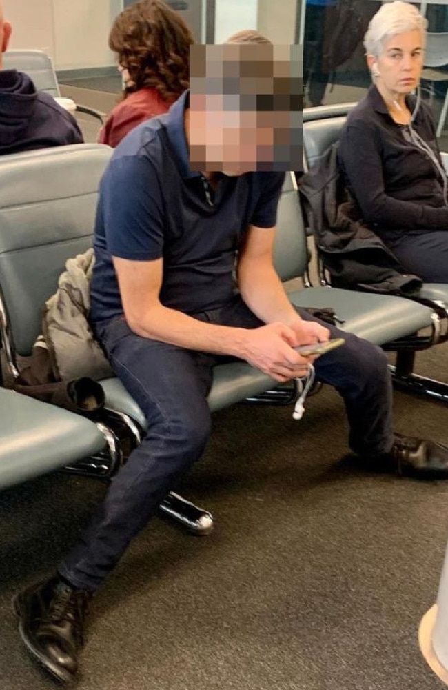 This man was slammed for manspreading at the airport.