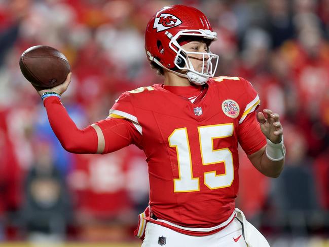 KANSAS CITY, MISSOURI - DECEMBER 08: Patrick Mahomes #15 of the Kansas City Chiefs throws a pass against the Los Angeles Chargers during the second quarter at GEHA Field at Arrowhead Stadium on December 08, 2024 in Kansas City, Missouri. (Photo by Jamie Squire/Getty Images)