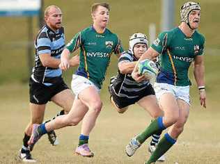 University inside-centre Simon Laing slips past a Maroochydore defender. Picture: Nicholas Falconer