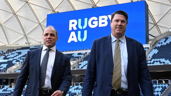 Former Australian player Phil Waugh (L) speaks with Chairman of the Board of Directors of the Australian Rugby Union Hamish McLennan during a press briefing in Sydney on June 6, 2023, after he was named chief executive of the national governing body Rugby Australia. (Photo by SAEED KHAN / AFP) / -- IMAGE RESTRICTED TO EDITORIAL USE - STRICTLY NO COMMERCIAL USE --