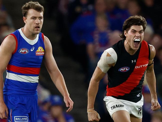 MELBOURNE, AUSTRALIA - APRIL 12: Sam Durham of the Bombers celebrates a goal during the 2024 AFL Round 05 match between the Western Bulldogs and the Essendon Bombers at Marvel Stadium on April 12, 2024 in Melbourne, Australia. (Photo by Michael Willson/AFL Photos via Getty Images)