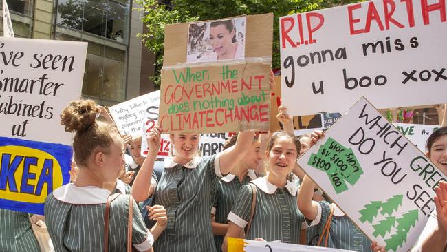 Students make their feelings known about a lack of government action on climate change. Picture: Jenny Evans