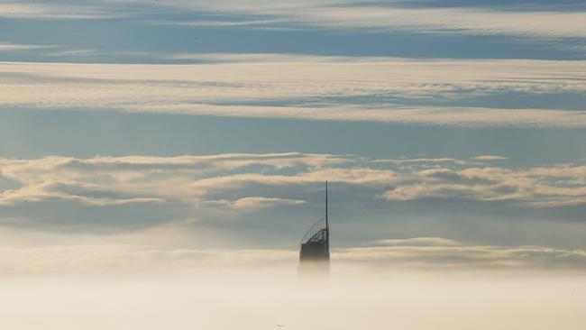 Q1 pokes through the morning fog which enveloped the Coast this morning. Picture Glenn Hampson