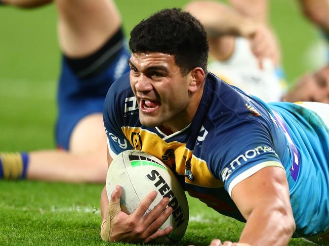 GOLD COAST, AUSTRALIA - JULY 16: David Fifita of the Titans scores a try during the round 18 NRL match between the Gold Coast Titans and the Parramatta Eels at Cbus Super Stadium, on July 16, 2021, in Gold Coast, Australia. (Photo by Chris Hyde/Getty Images)