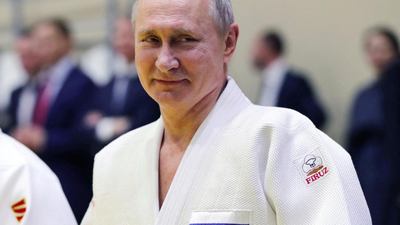 Russian President Vladimir Putin takes part in a training session with members of the Russian national judo team in Sochi. Picture: AFP