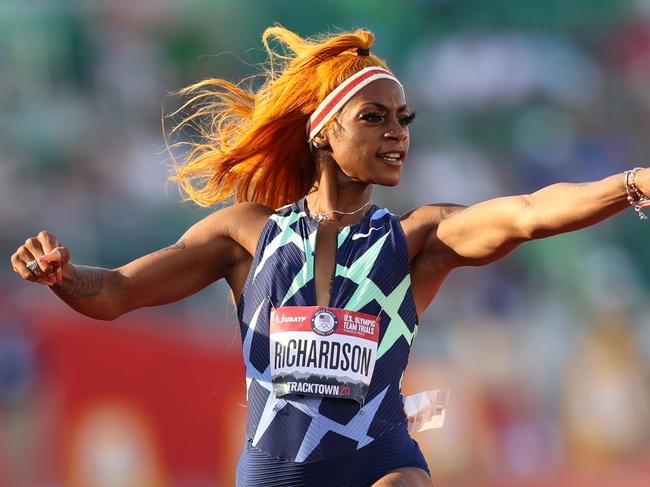 EUGENE, OREGON - JUNE 19: Sha'Carri Richardson runs and celebrates in the Women's 100 Meter semifinal on day 2 of the 2020 U.S. Olympic Track & Field Team Trials at Hayward Field on June 19, 2021 in Eugene, Oregon. (Photo by Patrick Smith/Getty Images)