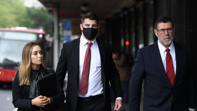 Curtis Scott (centre) outside Downing Centre court September last year. Picture: NCA NewsWire/Joel Carrett